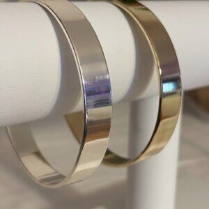 Beautiful Anne Klein Gold and Silver Tone Bangles (8) with pouch